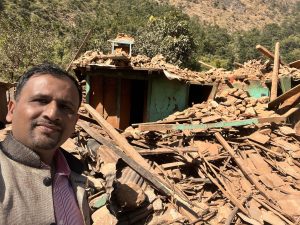 Disaster relief team giving warm blankets to earthquake survivors in Nepal